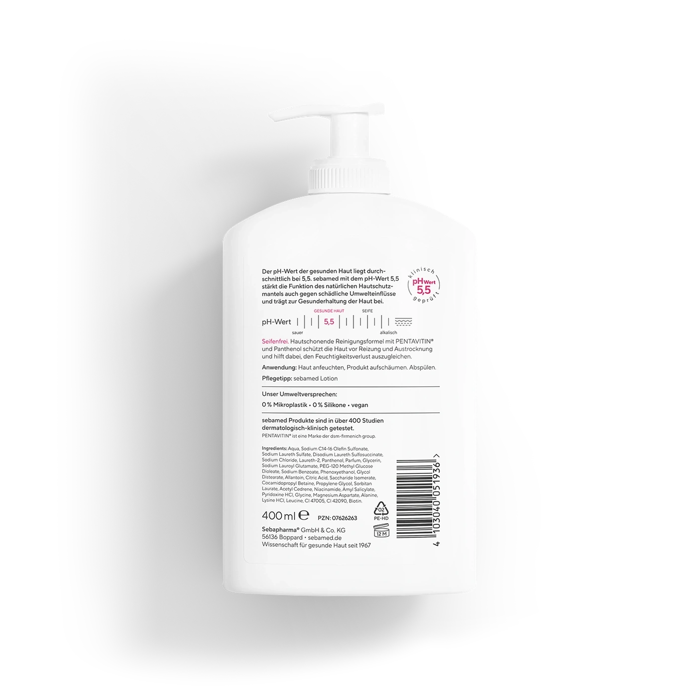 Ein weißer Pumpspender mit Lotion und Produktinformationen.