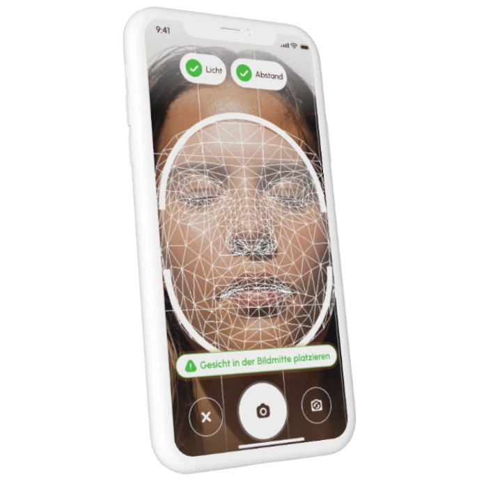 Gesichtserkennung auf einem Smartphone mit 3D-Gitter und Anweisungen.